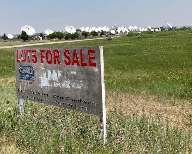 Lots ideally suited for data center development are being rapidly purchased by hyperscalers in Cheyenne, Wyoming, such as this parcel, vacant in late June, in Cheyenne Business Park, where EchoStar operates a nearby data center and satellite uplink installation. (John Haughey/The Epoch Times)