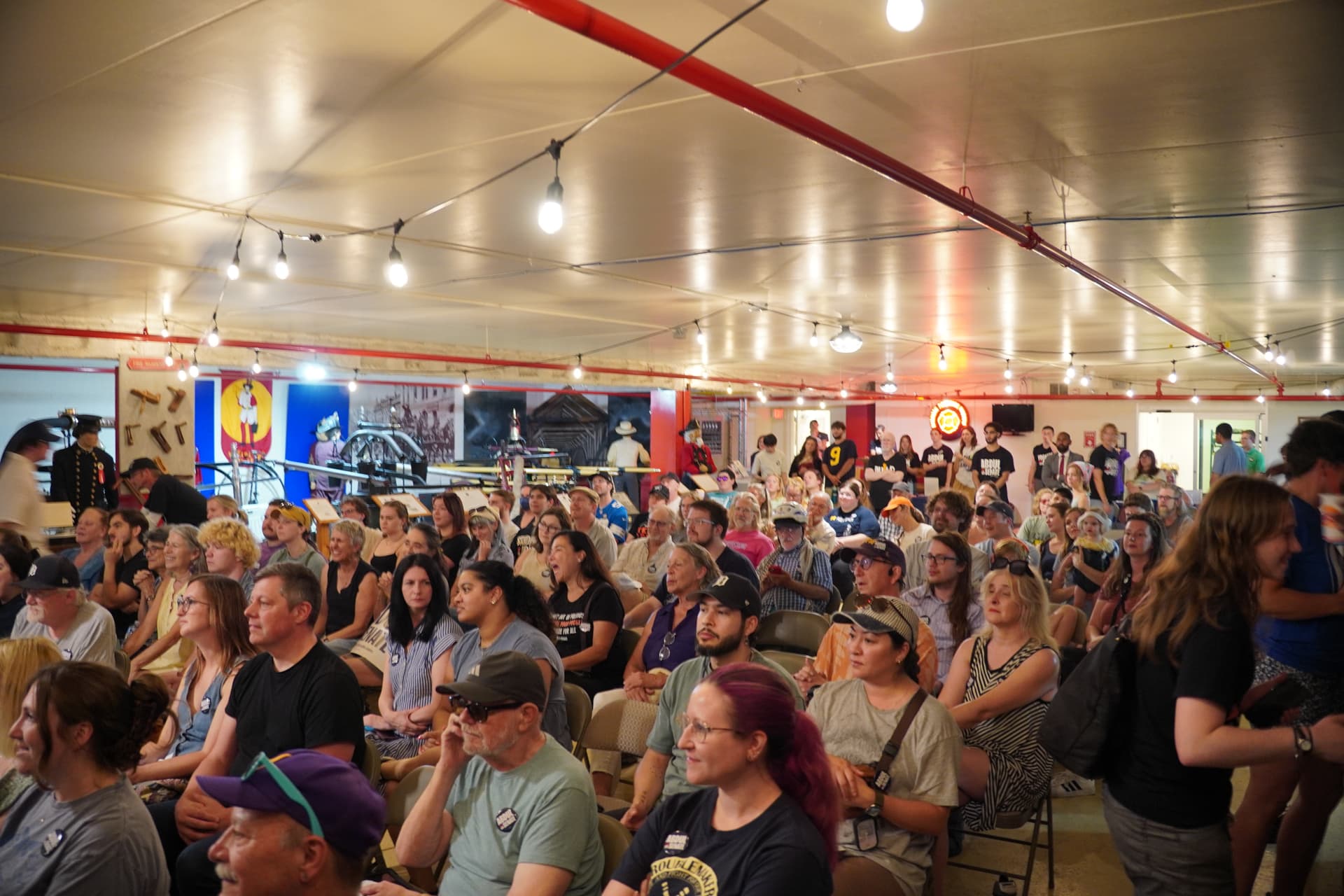 Potential voters fill the room at a rally for Michigan Democratic Senate candidate Abdul El-Sayed at the Michigan Firehouse Museum and Education Center in Ypsilanti, Mich., on July 30, 2026. (Jacob Burg/The Epoch Times)