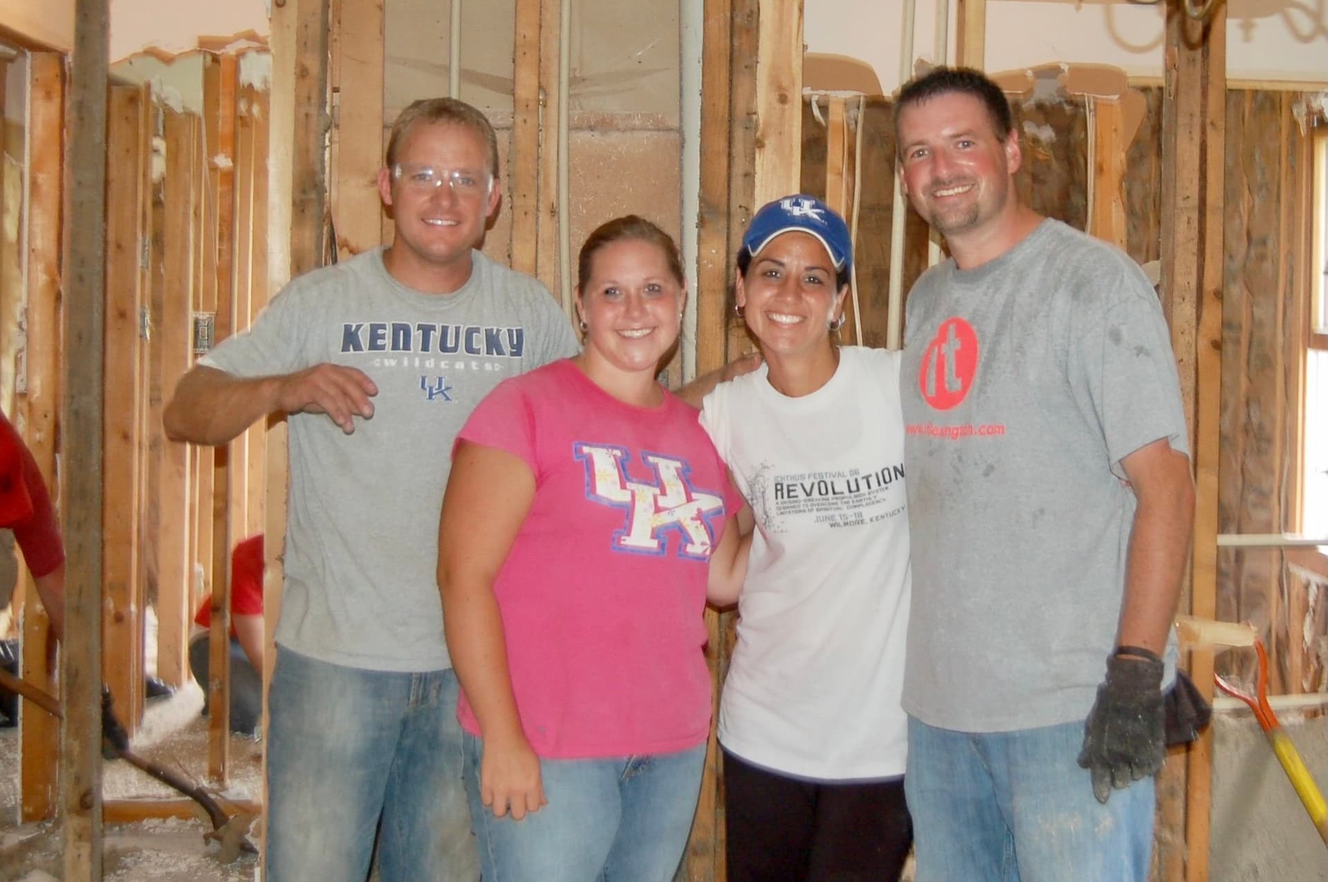 Michelle and Ked Frank (2nd from R and R) with helpers, in the Kentucky farmhouse they rehabbed to become their first shelter for human trafficking victims, in 2010. (Courtesy of Ked and Michelle Frank).