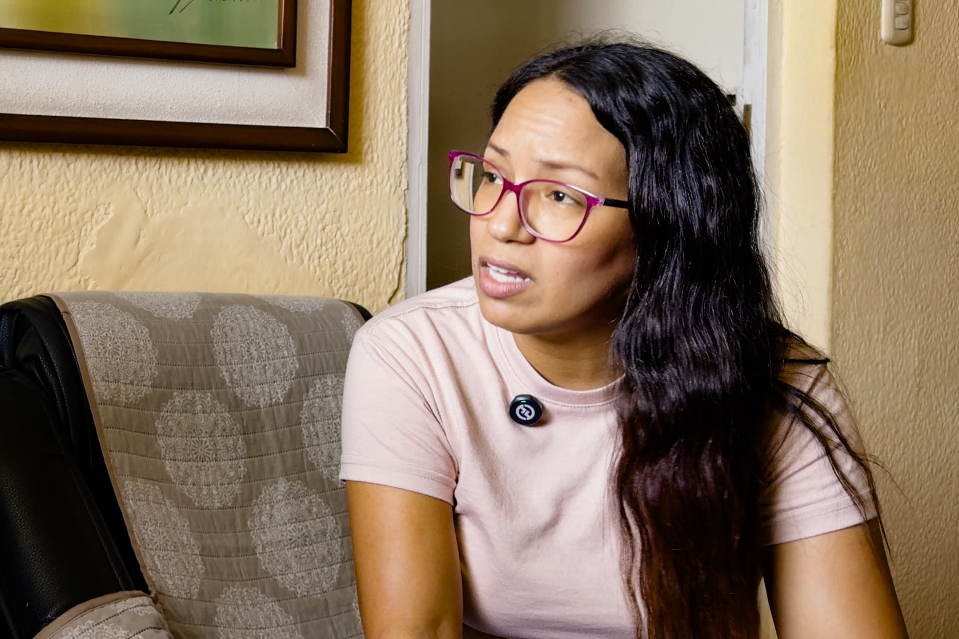 Hiowanka Ávila shares some of the methods the Venezuelan regime has used to torture her brother, who is being held in El Rodeo prison, at her home in the Catia neighborhood of Caracas, Venezuela, on July 8, 2026. (Frederico Vidovix/The Epoch Times)