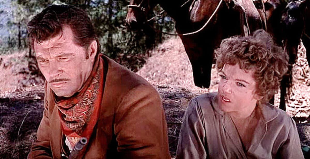 Teniente Ezparza (James Craig) and Angélica (Martha Roth), in “Massacre.” (GJW+)