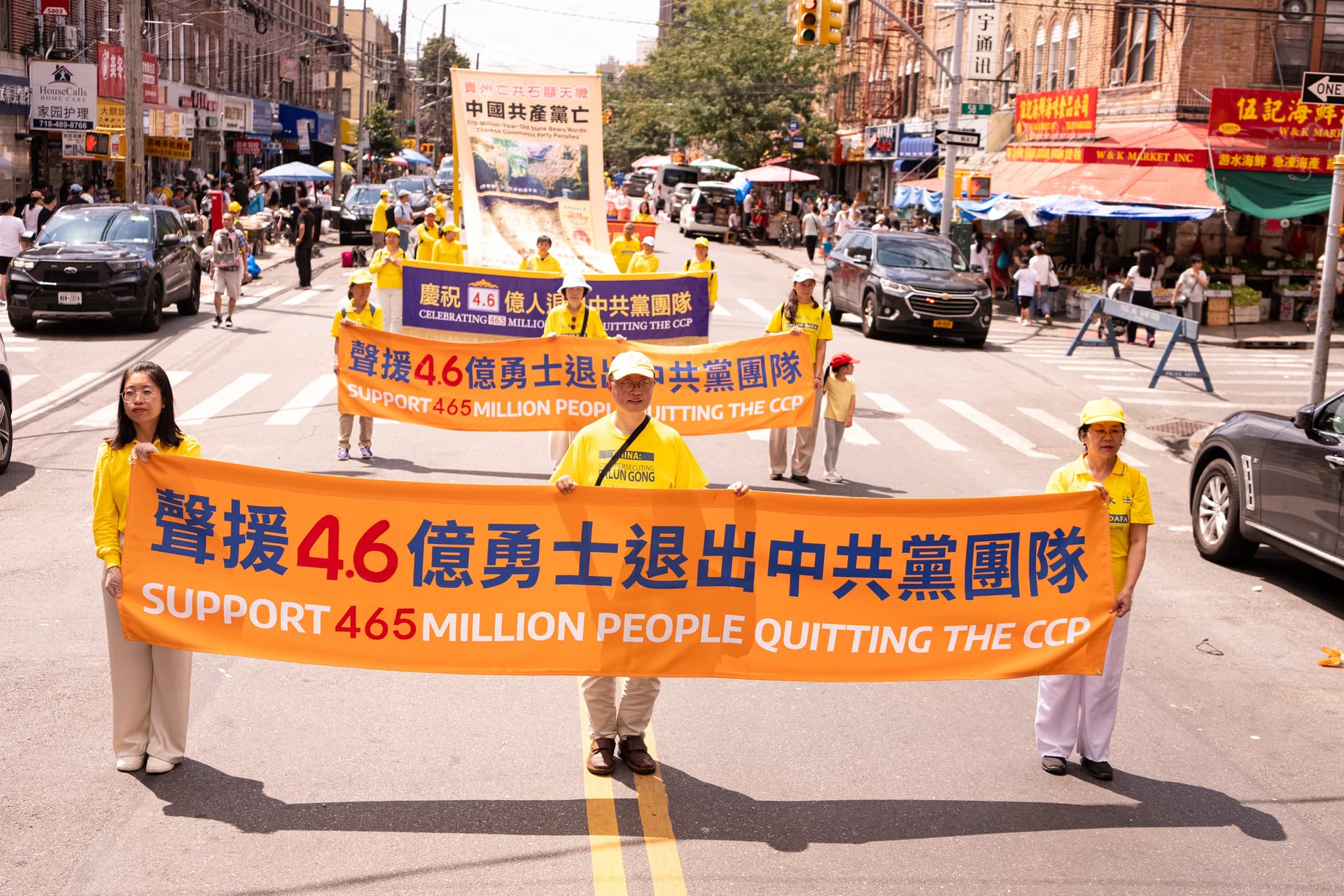 Falun Dafa practitioners take part in a march in New York City on Aug. 23, 2026. (Larry Dye/The Epoch Times)