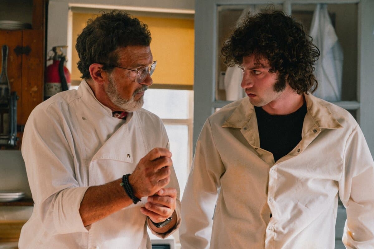 Chef (Antonio Banderas, L) and Tony (Dominic Sessa), in "Tony." (Seacia Pavao/A24)