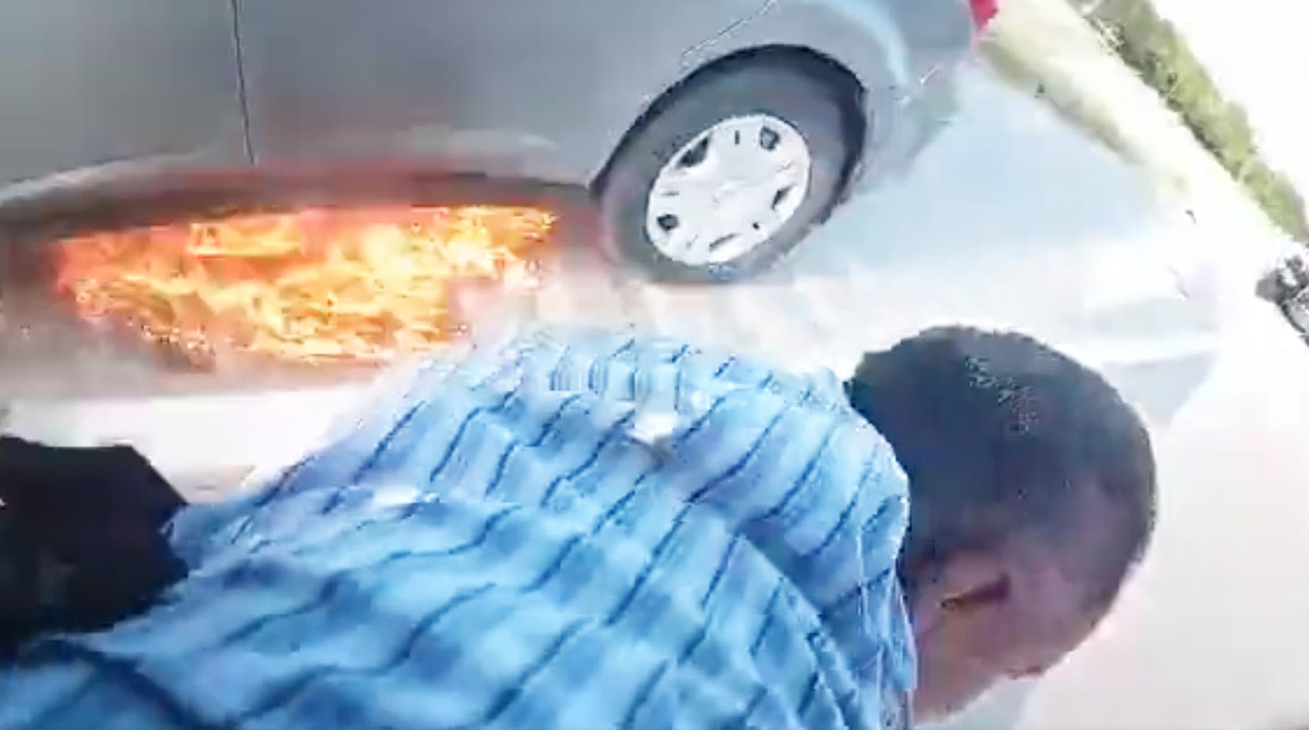Footage from Corporal Joshua Swisher’s dashcam and bodycam shows the officer responding to a vehicle fire and rescuing the driver on the shoulder of State Highway 114 in Southlake, on June 7, 2026. (Southlake Department of Public Safety)