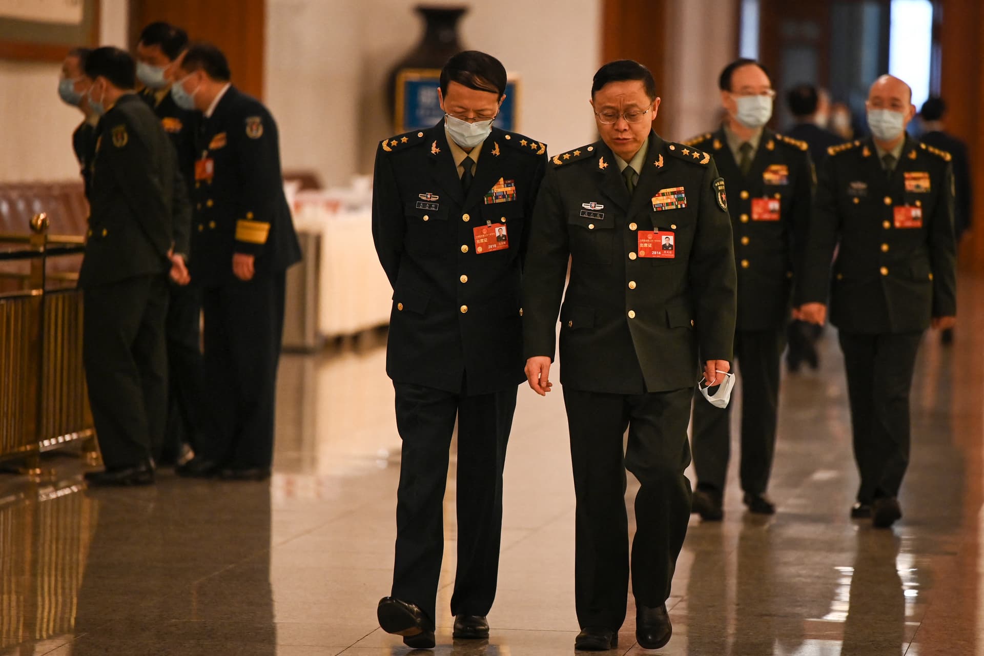 Military delegates arrive for the fourth plenary session of the rubber-stamp National People's Congress at the Great Hall of the People in Beijing on March 11, 2023. (Greg Baker/Pool via Getty Images)