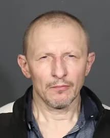 Bogdan Detrovich Gren, an illegal alien from Ukraine, has a criminal past that includes convictions for kidnapping, abduction resulting in death, criminal possession of a weapon, and murder. He was arrested by federal immigration agents during Operation Rotten Apple in New York. (DHS)