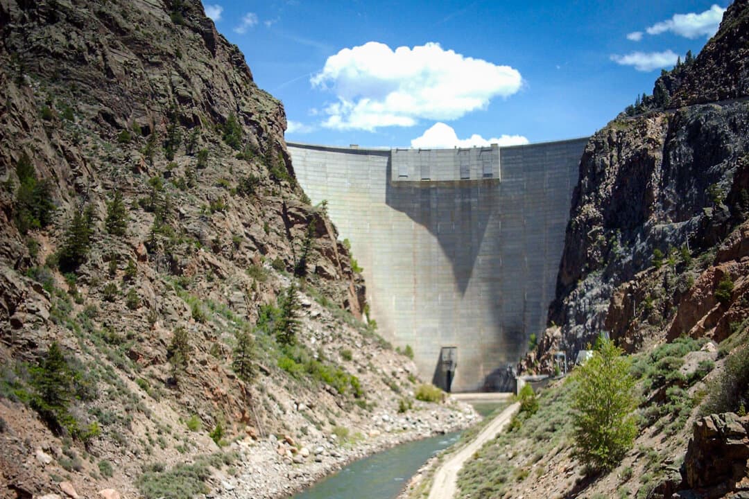 (Left) The Flaming Gorge Reservoir, on the border between Wyoming and Utah, on Sept. 23, 2014. The reservoir, located in the Colorado River's Upper Basin, is currently at 71 percent of its capacity. (Center)  Crystal Creek Reservoir in the Pike National Forest below Pike's Peak, Colo.,on Aug. 28, 2013. The Upper Basin reservoir is currently at 89 percent of its capacity. (Right) The Morrow Point Reservoir in Cimarron, Colo., in the Colorado River's Upper Basin, in this file photo. The reservoir is at 97 percent of capacity. (Paul Hermans/CC BY-SA 3.0, Fredlyfish4/CC BY-SA 3.0, Nationalparks/CC BY-SA 2.5) 