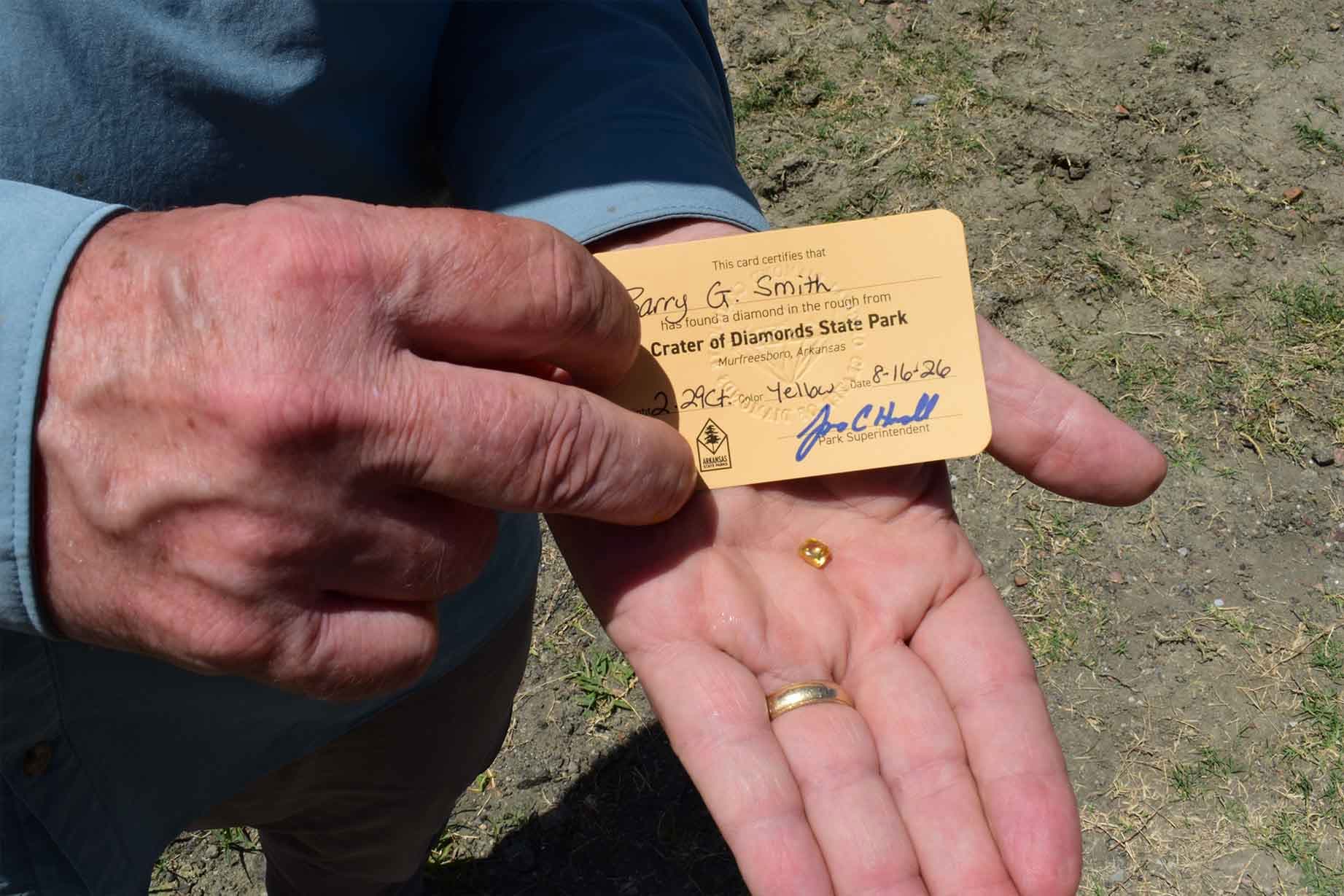 Smith shows his Sage Juniper Diamond and registration tag on Aug. 16, 2026. (Crater of Diamonds State Park)