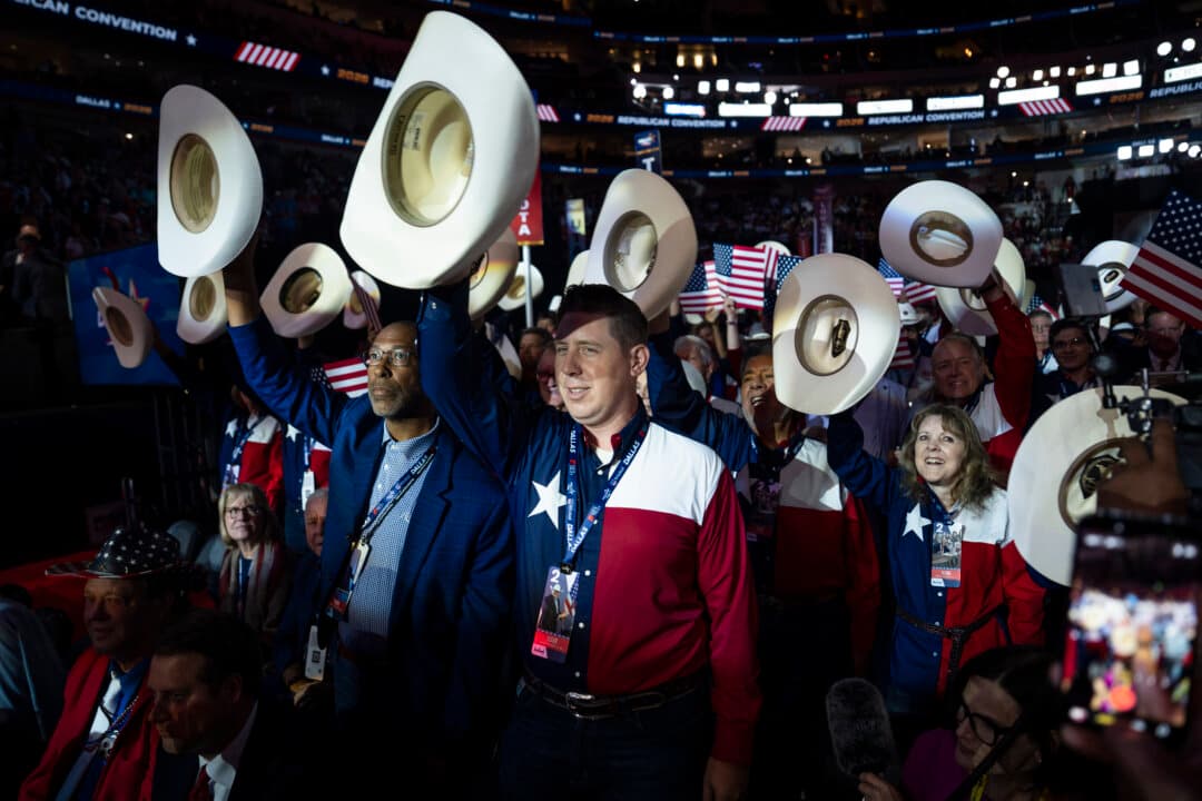 Attendees hold their hats at the second day of the 2026 Republican National Committee Midterm Convention in Dallas on Sept. 10, 2026. (Madalina Kilroy/The Epoch Times)