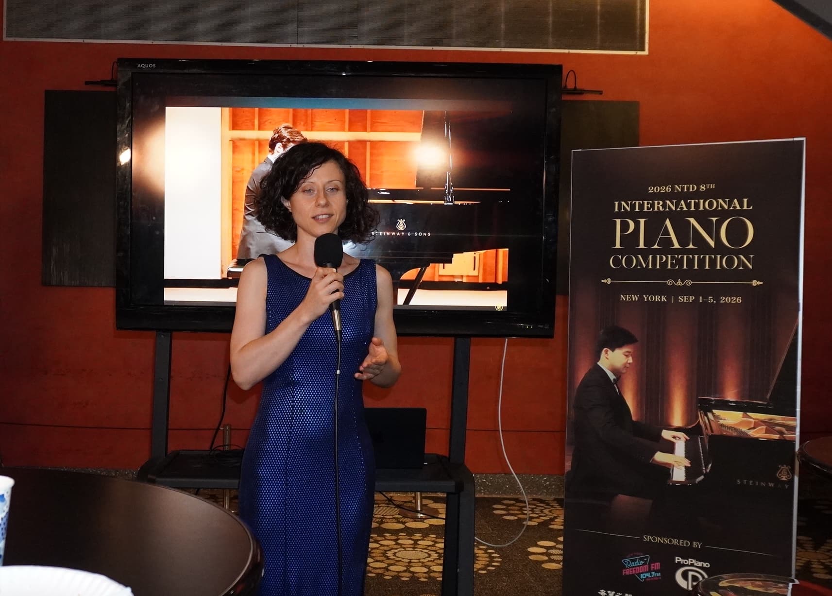 Polish pianist Elzbieta Bilicka, Silver Award winner at the Eighth NTD International Piano Competition, delivers her remarks during the awards celebration banquet following the winners’ concert in New York City on Sept. 5, 2026. (Lily Yu/The Epoch Times)