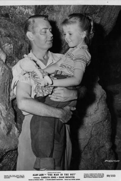 John Hamilton (Alan Ladd) and Angel Jones (Susan Gordon), in “Man in the Net.” (United Artists)