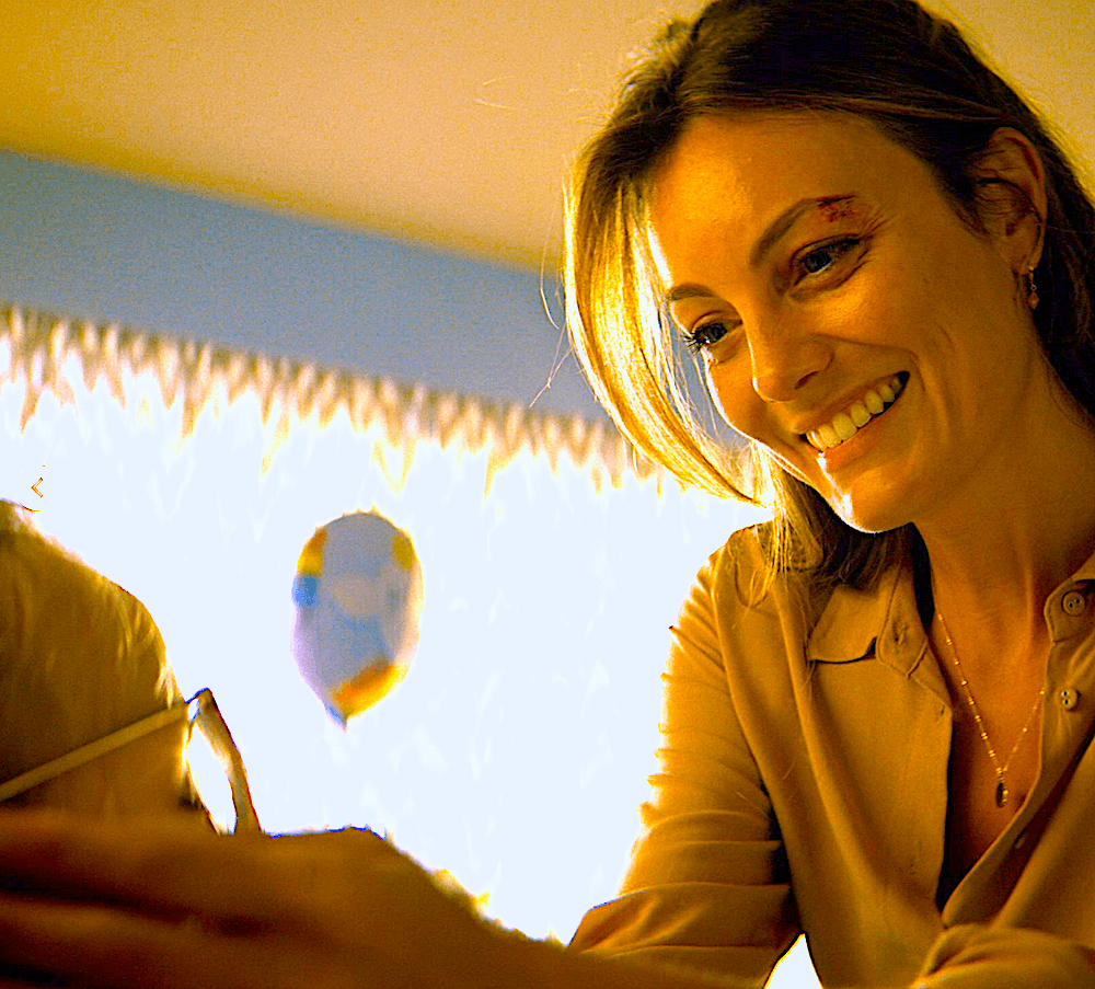 Kate Baker (Leila George) is hopeful for her daughter Ellie's health, in "Runner." (Angel Studios)