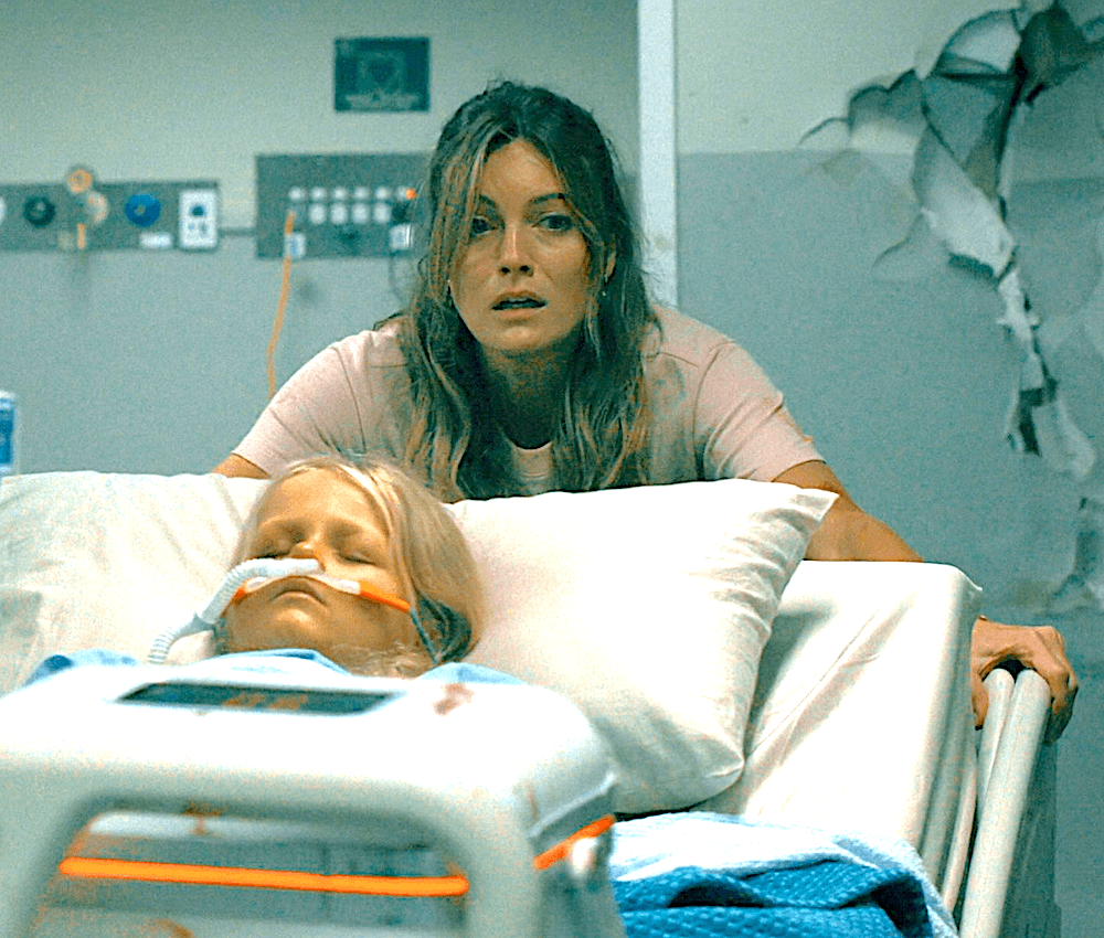 Kate Baker (Leila George) with her sick daughter Ellie (Scarlett Crabtree), in "Runner." (Angel Studios)