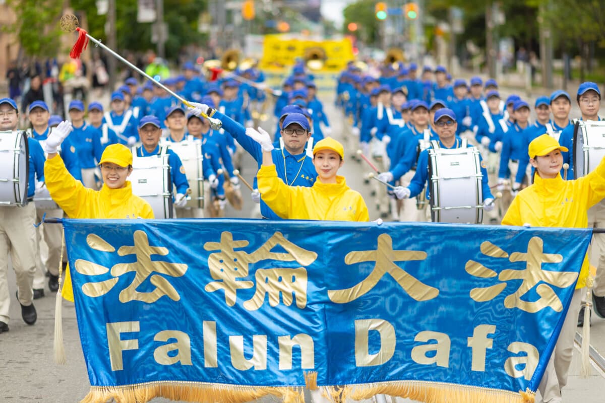 The Tian Guo Marching Band takes part in a parade in downtown Toronto to call for an end to the Chinese regime's persecution and transnational repression, on Sept. 19, 2026. (Alex Gurevich)