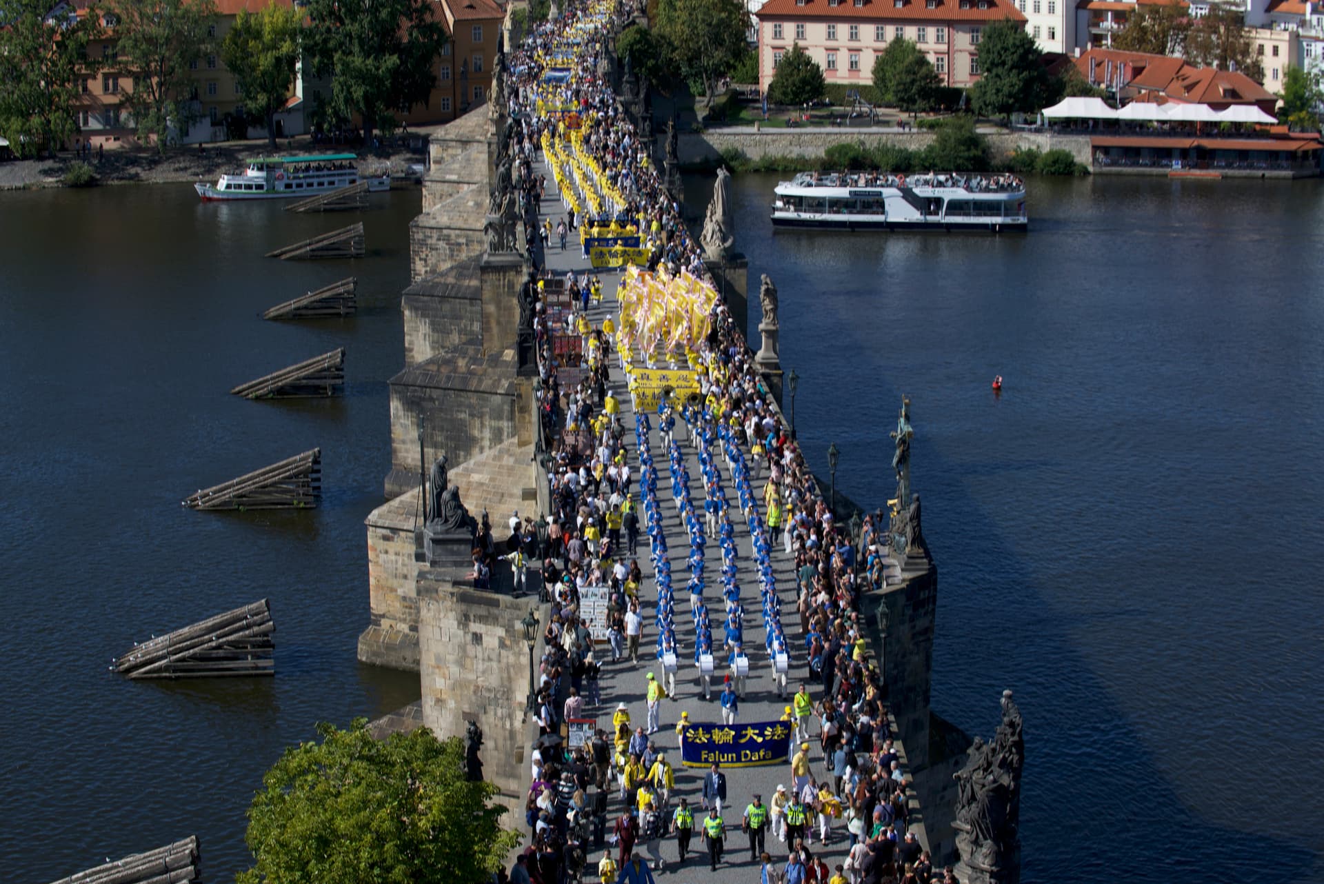 Falun Gong practitioners from across Europe join a parade in Prague on Sept. 19, 2026. (Marius Iacob/The Epoch Times)