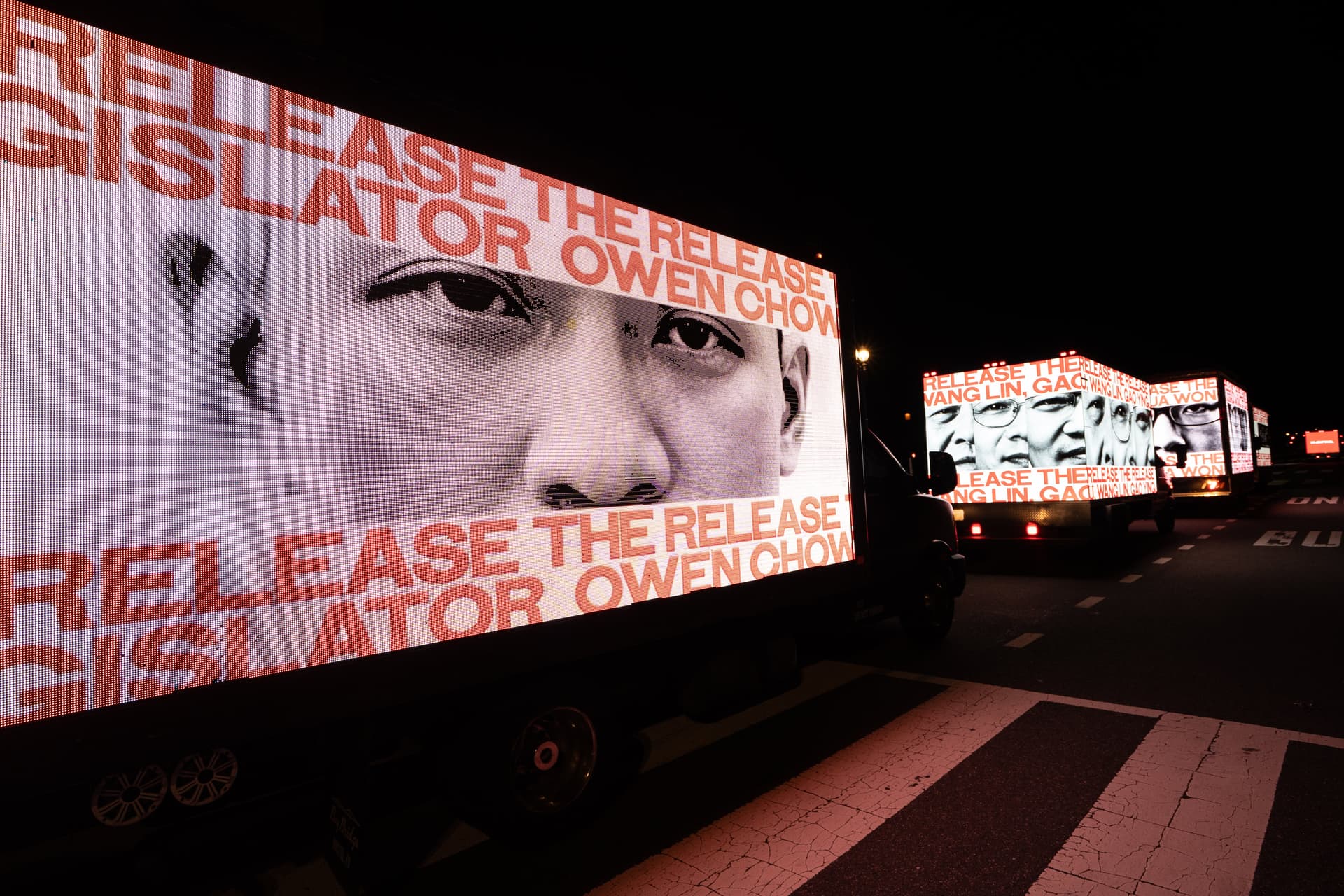 The faces and names of some political prisoners held in China are displayed on trucks, as Chinese leader Xi Jinping participates in a state visit to Washington on Sept. 23, 2026. (Samira Bouaou/The Epoch Times)