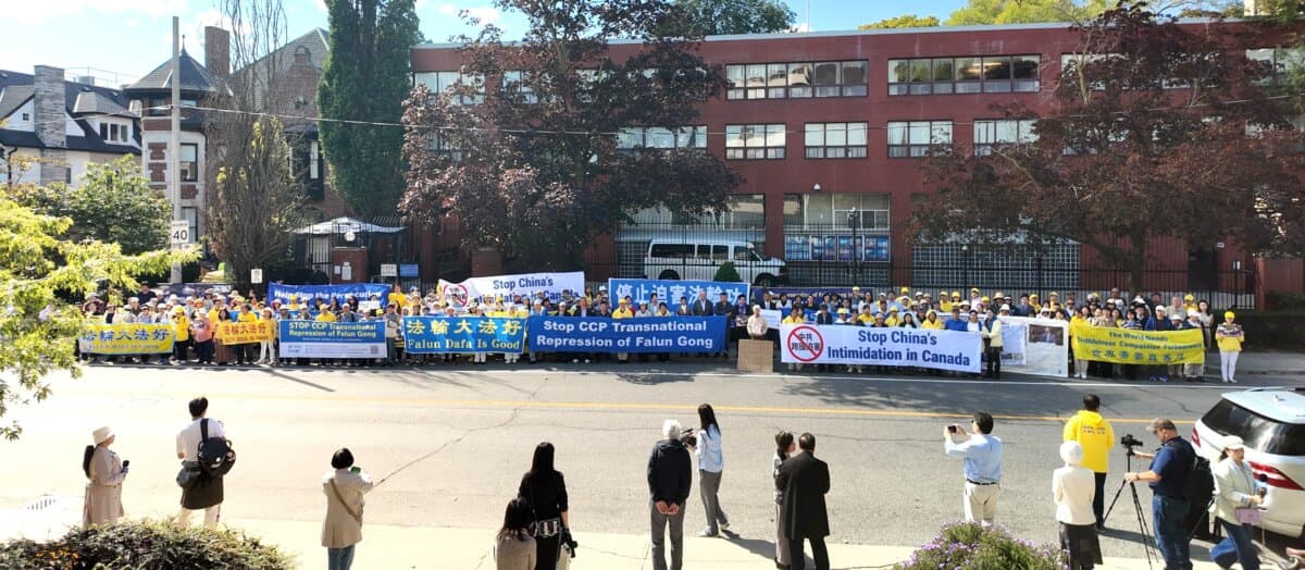 Falun Gong practitioners and supporters gather outside the Chinese Consulate in Toronto, after Falun Gong practitioners were attacked earlier in the week, on Sept. 24, 2026. (Melissa Li/The Epoch Times)