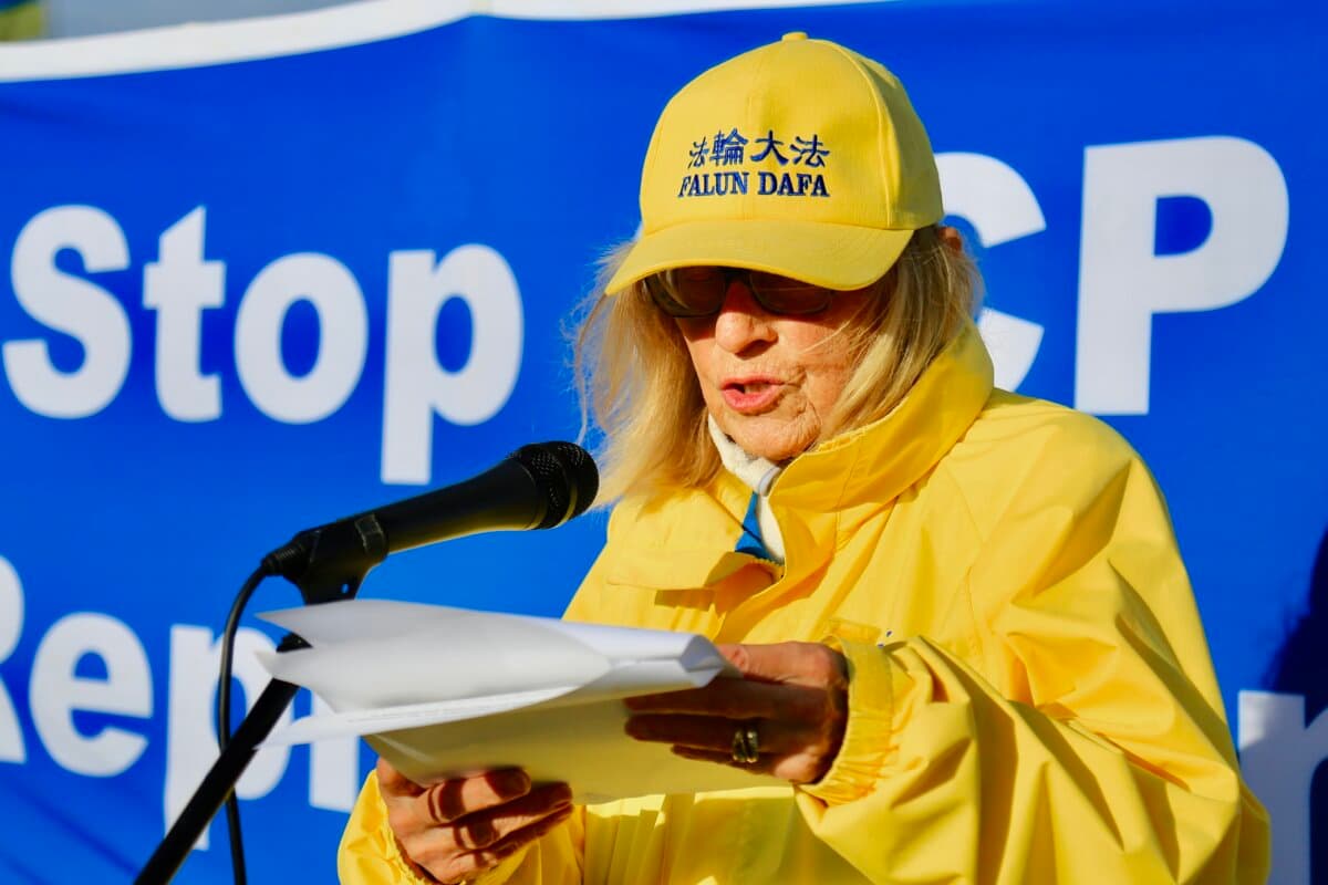 Falun Gong practitioner Kathy Gillis reads a statement from the Falun Dafa Association of Canada at a rally outside Global Affairs Canada in Ottawa on Sept. 28, 2026, calling on the government to condemn the attack on Falun Gong practitioners that took place outside the Chinese Consulate in Toronto on Sept. 22, 2026. (Jonathan Ren/The Epoch Times)
