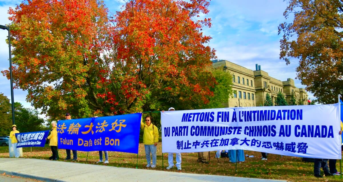 Falun Gong practitioners and supporters hold a rally outside Global Affairs Canada in Ottawa on Sept. 28, 2026, to ask the government to condemn the attack on Falun Gong practitioners that took place outside the Chinese Consulate in Toronto on Sept. 22, 2026. (Jonathan Ren/The Epoch Times)