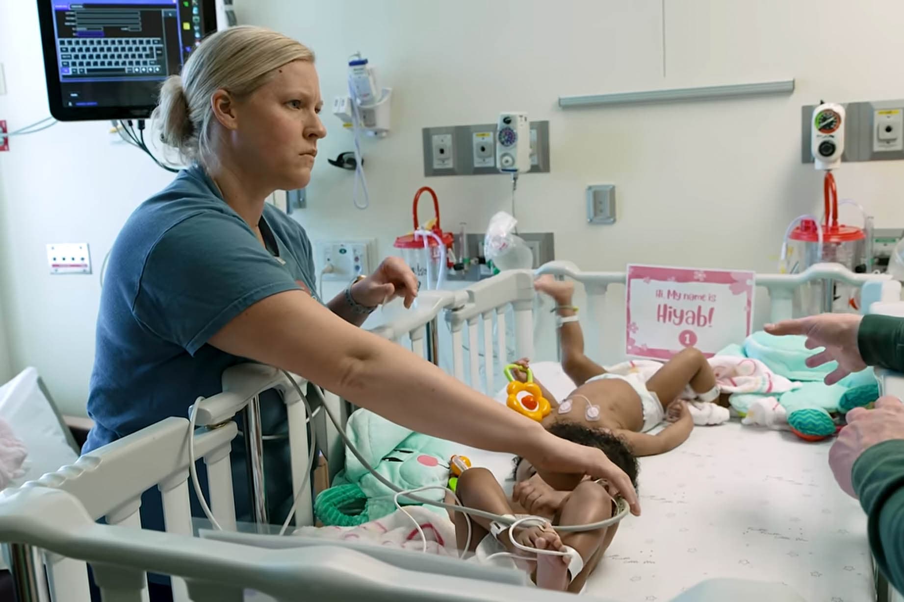 A medical professional monitors one of the conjoined twin sisters prior to having surgery at SSM Health Cardinal Glennon Children's Hospital. (SSM Health Cardinal Glennon Children's Hospital)