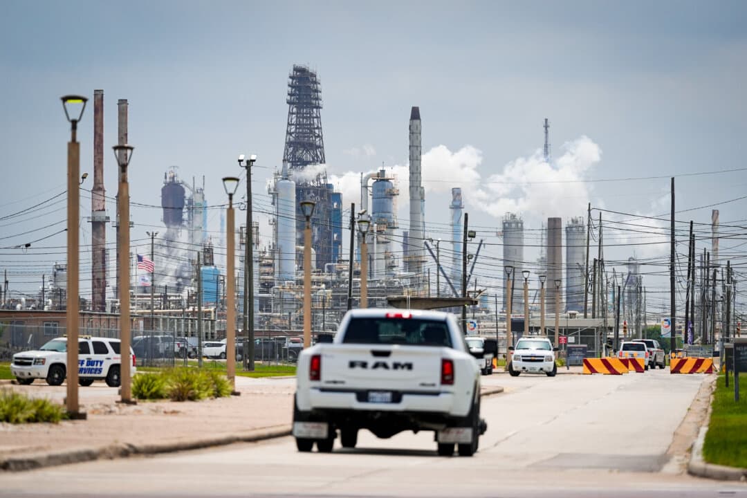 A truck enters the Exxon Mobil Baytown Olefins Plant in Baytown, Texas, on April 29, 2026. The Supreme Court will consider whether local governments can use state laws to sue fossil fuel companies over so-called climate change. (Ashley Landis/AP Photo/File)