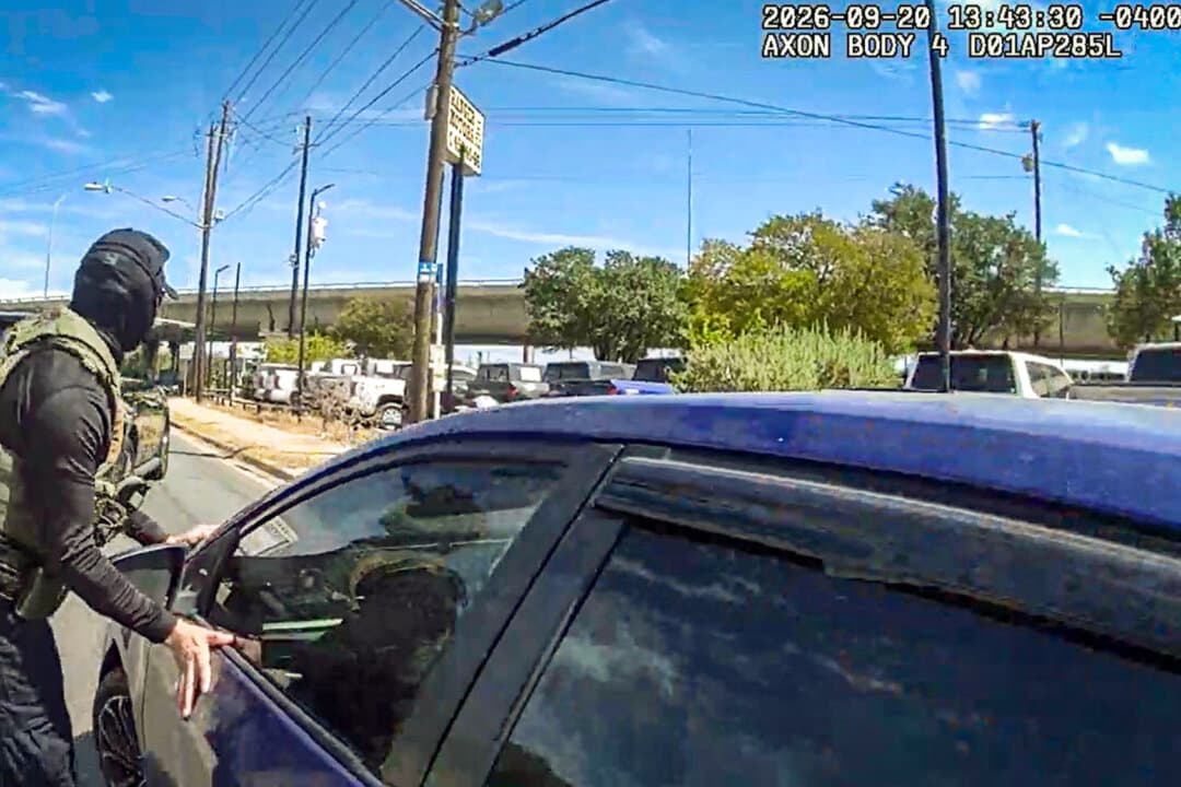 This image made from Immigration and Customs Enforcement (ICE) body camera footage shows an ICE officer stopping Wilber Rafael Garces Perez in Austin, Texas, on Sept. 20, 2026. (Immigration and Customs Enforcement via AP)