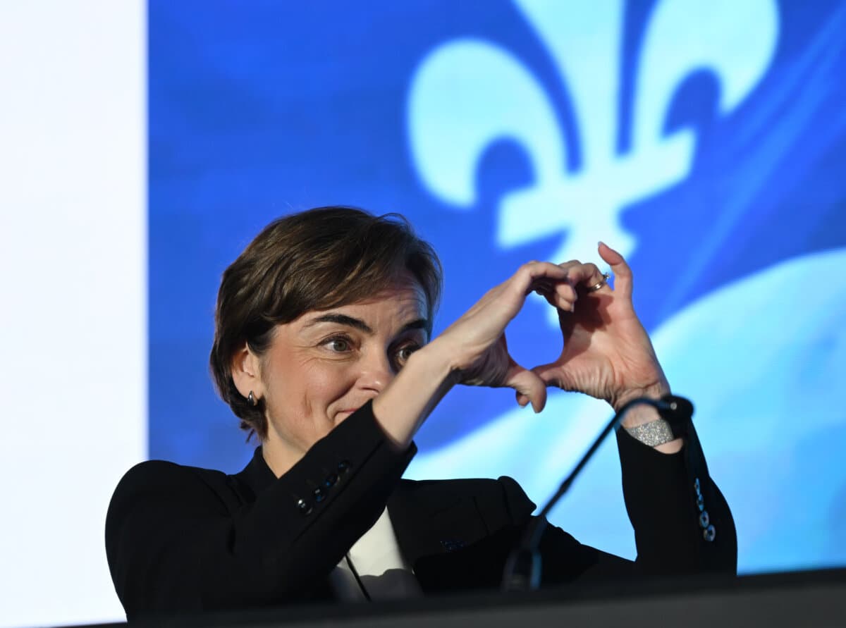 Coalition Avenir Quebec Leader and incumbent Premier Christine Fréchette makes a heart shape at the end of her speech at the Coalition Avenir Quebec election night headquarters in Trois-Riviéres, Que., on Oct. 5, 2026. (The Canadian Press/Jacques Boissinot)