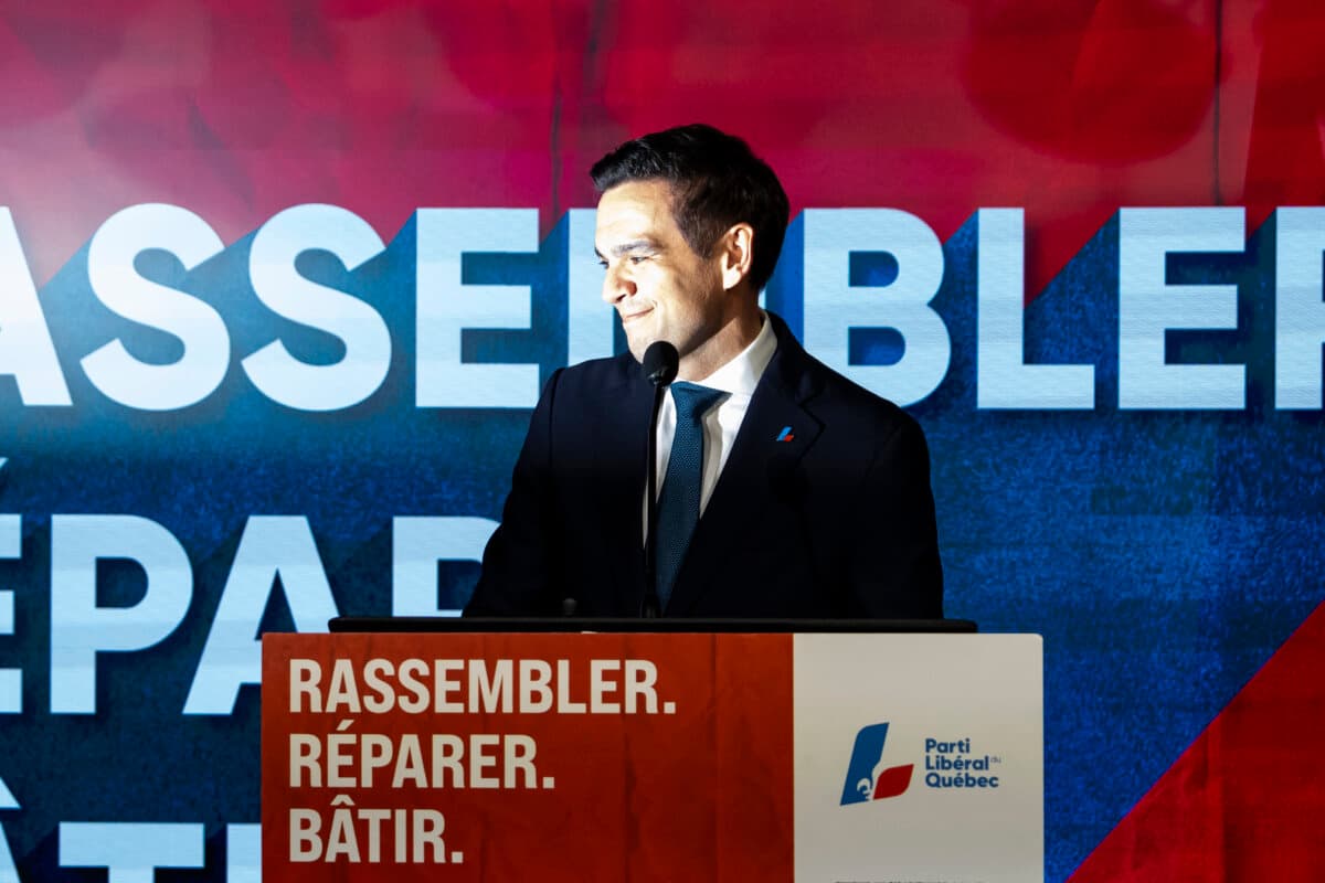 Quebec Liberal Party Leader Charles Milliard celebrates on stage on election day in North Hatley, Que., on Oct. 5, 2026. (The Canadian Press/Christopher Katsarov)