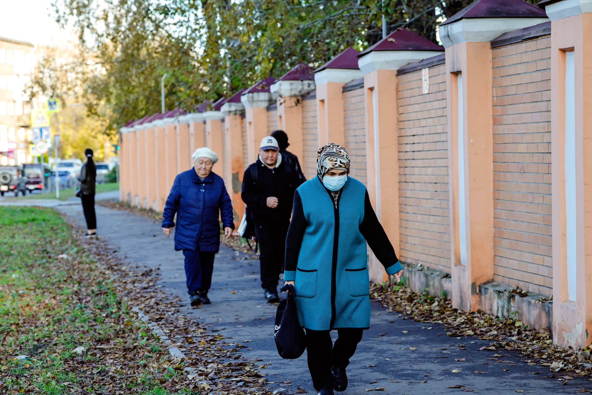 A masked woman passes the anti-plague institute in Irkutsk, Russia, on Oct. 7, 2026. (Tatyana Makeyeva/AFP via Getty Images)