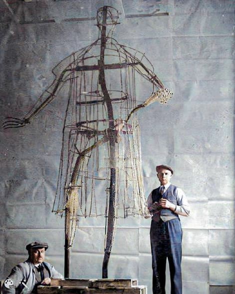 (Left) A statue of Christopher Columbus stands in downtown Syracuse, N.Y., on Sept. 5, 2025. The existence of the city's Columbus statue—and that of others throughout the United States—remains under threat as activists continue to push for their removal. (Right) Sculptor Lorenzo Baldi stands in his studio in Florence, Italy, in this historic photo. Baldi was hired to sculpt the statue of Columbus that has stood in downtown Syracuse since 1934. (Michael Hill/AP Photo, Courtesy of Anthony Illacqua)