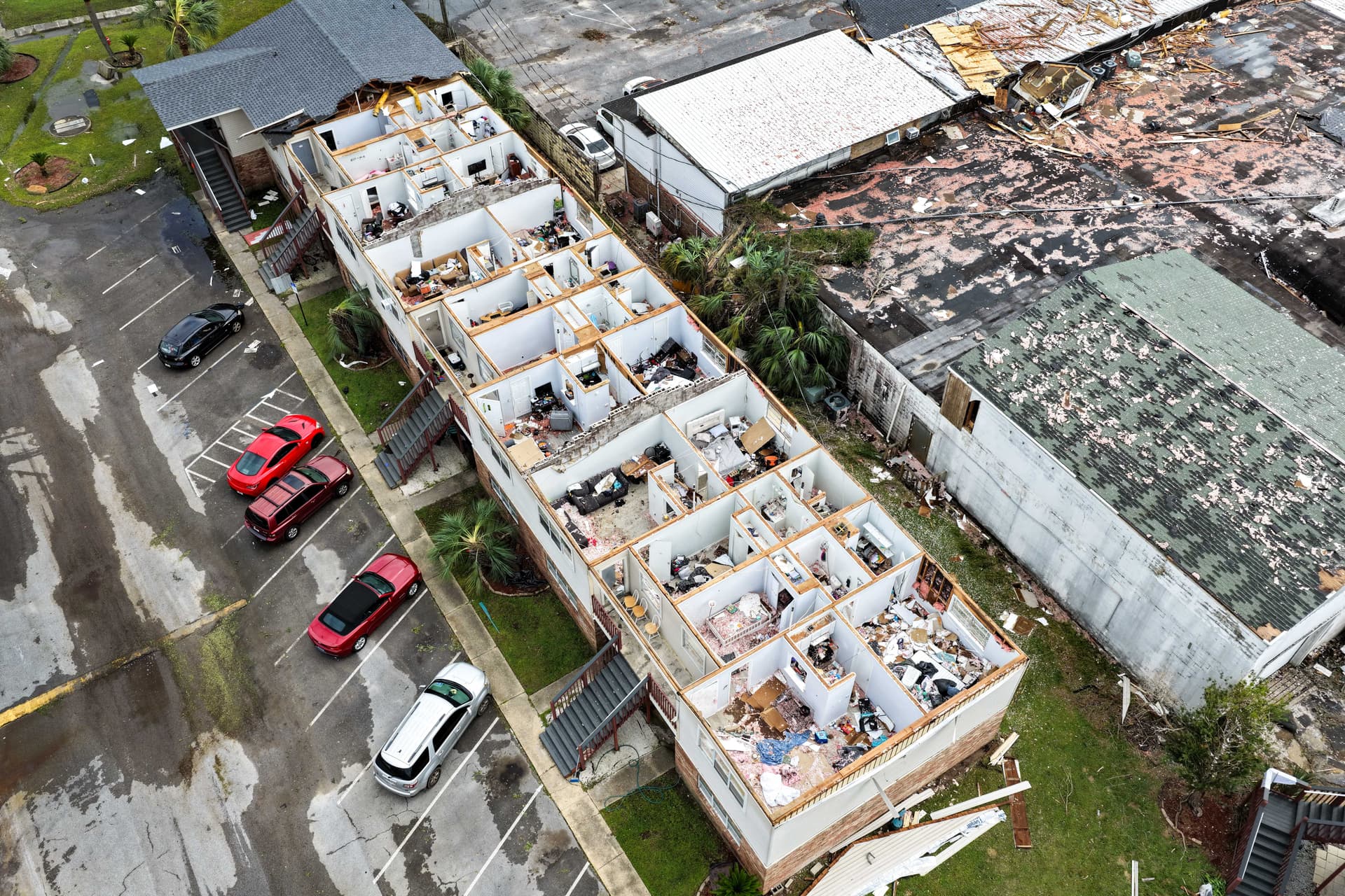 Blown-off roofs after Hurricane Isaias passed through the area in Milton, Fla., on Oct. 10, 2026. Hurricane Isaias made landfall as the season's first Atlantic hurricane with category two winds.  (Joe Raedle/Getty Images)