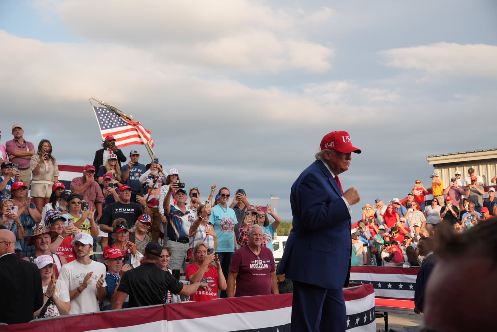 President Donald Trump walks down a red carpet after finishing a roughly hour-and-a-half speech in Dalton, Ga., on Oct. 16, 2026. (Troy Myers/The Epoch Times)