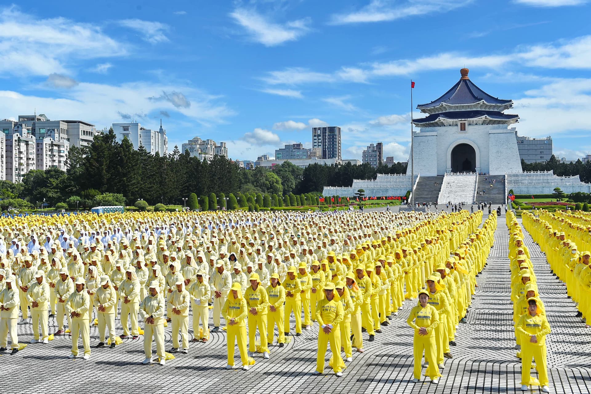Falun Gong practitioners take part in a group exercise in Taipei, Taiwan, on Oct. 17, 2026. (Vida Sun/The Epoch Times)