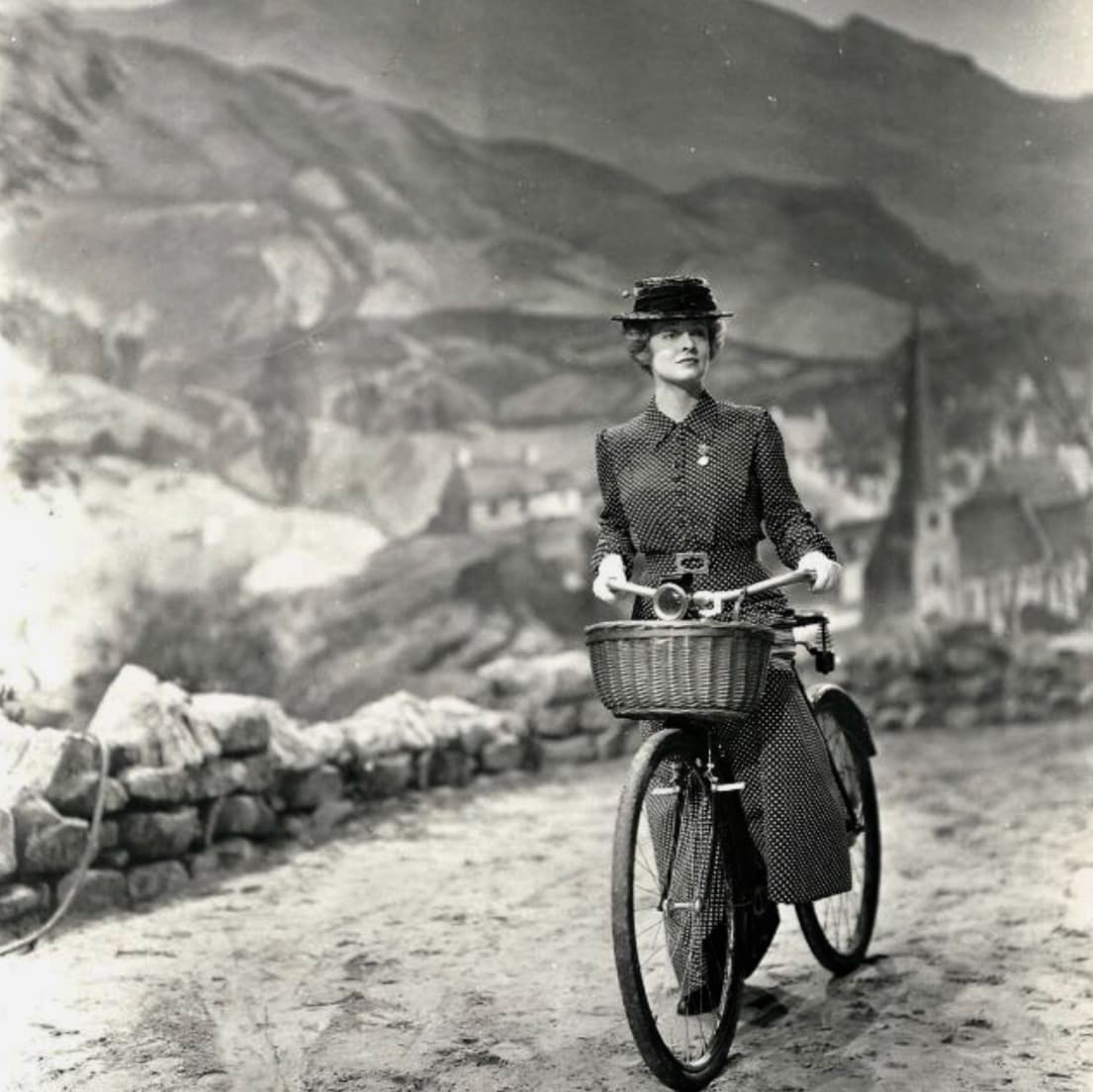 Miss Moffat (Bette Davis) arrives in a Welsh mining town, in "The Corn Is Green." (Warner Bros.)