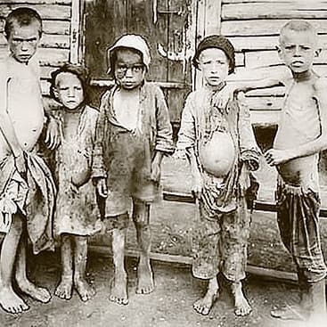 (Left) Cambodian children scavenge amid the ruins left by an insurgent Khmer Rouge attack on a shanty town on the edge of Phnom Penh, Cambodia, in February 1974. Hunger would continue to be a way of life for these children: Famine would claim the lives of up to 1.5 million people in Cambodia after the Khmer Rouge seized control. (Center) Russian children display the ravages of malnutrition in west-central Russia, in 1921. The Russian famine of 1921–1922 killed an estimated 5 million people. A decade later, the Soviet famine of 1932–1933 would result in the deaths of up to 10.8 million people. (Right) Chinese refugees wait for a meal in Hong Kong in May 1962. During the famine caused by Mao Zedong's "Great Leap Forward," up to 200,000 starving Chinese fled to British-ruled Hong Kong. (Carl D. Robinson/AP Photo/File, Public Domain, AFP Photo via Getty Images)
