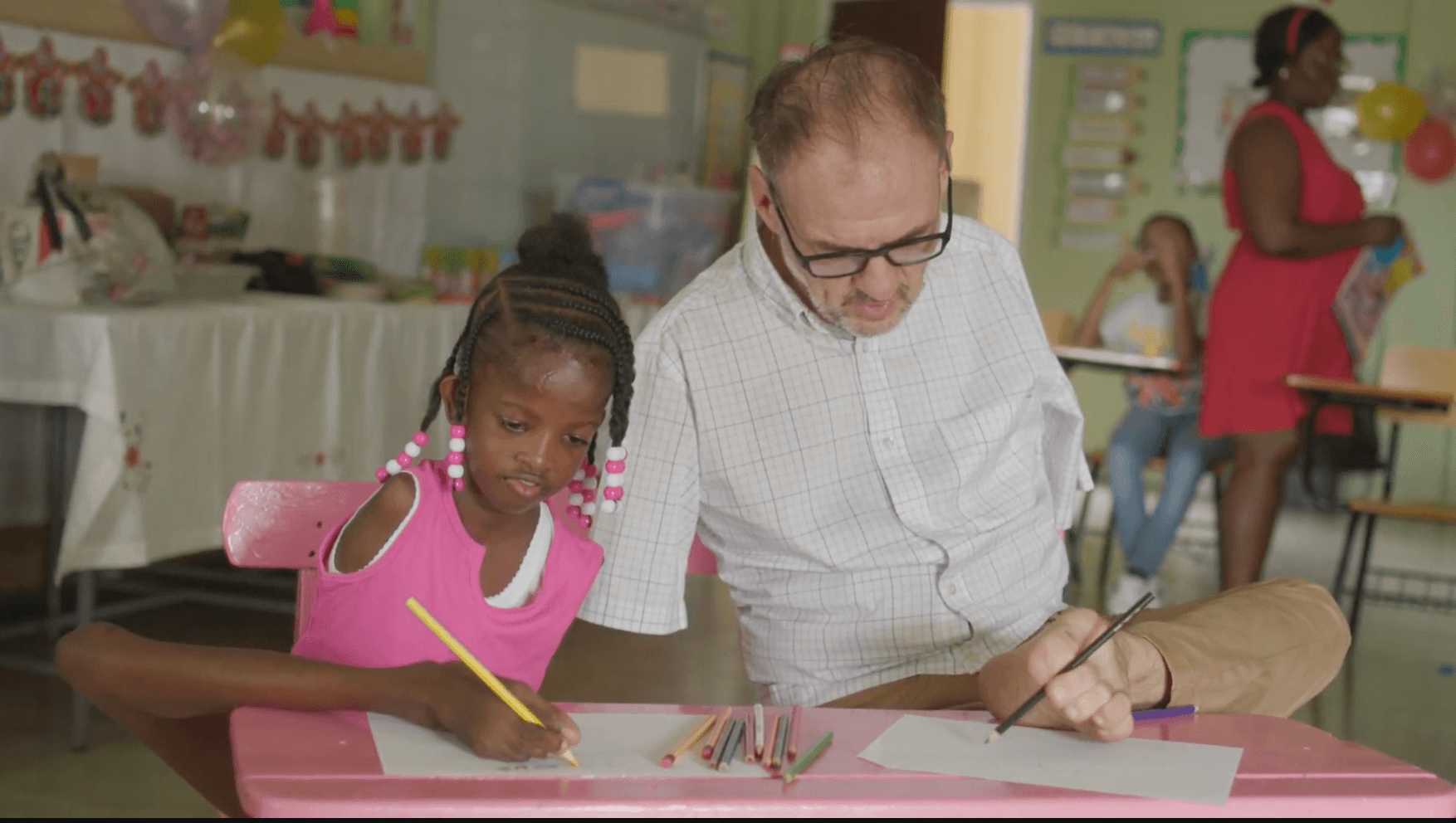 John Foppe, founder of the nonprofit Friends of the Forgotten, mentoring a child. (Courtesy of John Foppe)