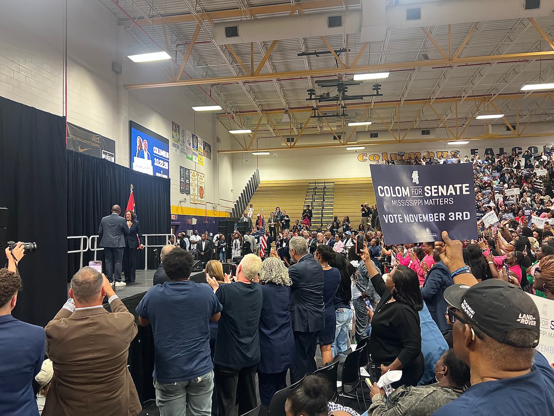 Former Vice President Kamala Harris with U.S. Senate candidate Scott Colom during a rally at Columbus High School, Miss., on Oct. 22, 2026. (Jacki Thrapp/The Epoch Times)
