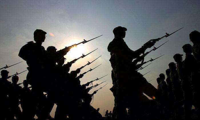 New army recruits march during military training at Guangzhou University in China's Guangdong Province, on Sept. 20, 2005. (China Photos/Getty Images)