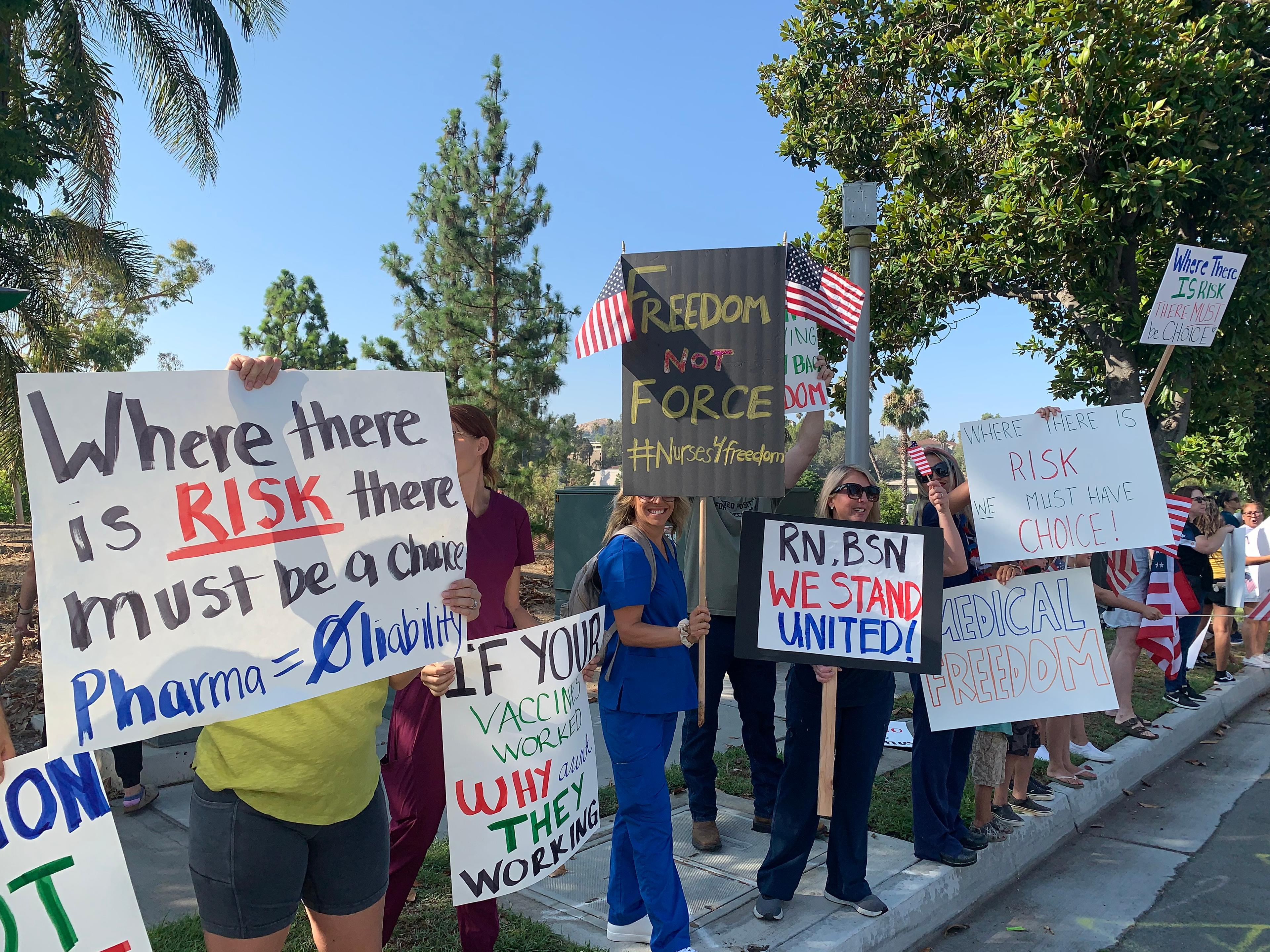 More than 400 medical professionals in Southern California rallied outside Riverside Community Hospital on Aug. 9 to protest the state’s requirement that all health workers be fully vaccinated against COVID-19. (Linda Jiang/The Epoch Times)