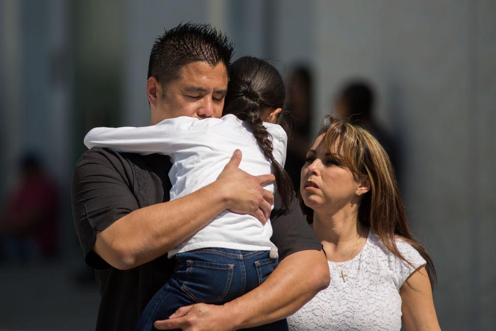North Park Elementary School students and parents are reunited at Cajon High School after a shooting at their school in San Bernardino, Calif., on April 10, 2017. (David McNew/Getty Images)