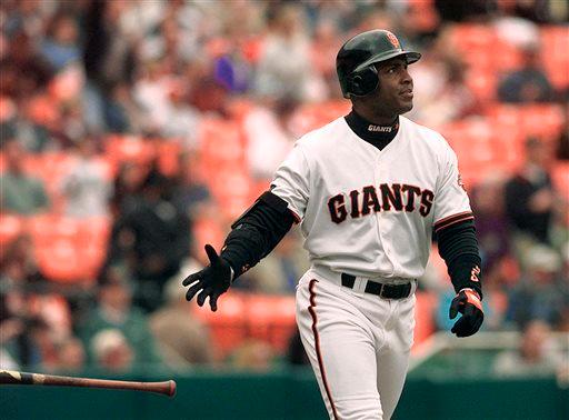 San Francisco's Barry Bonds tosses his bat after hitting a home run against the Montreal Expos at Candlestick Park on Aug. 18, 1999. The Giants haven’t had a player hit 30 home runs in a season since Bonds swatted 45 in 2004. (AP Photo/Ben Margot)
