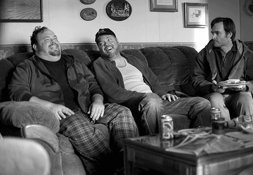 (L–R) Cole (Devin Ratray) and Bart (Tim Driscoll) disrespect cousin David Grant (Will Forte), in "Nebraska." (Paramount Vantage)