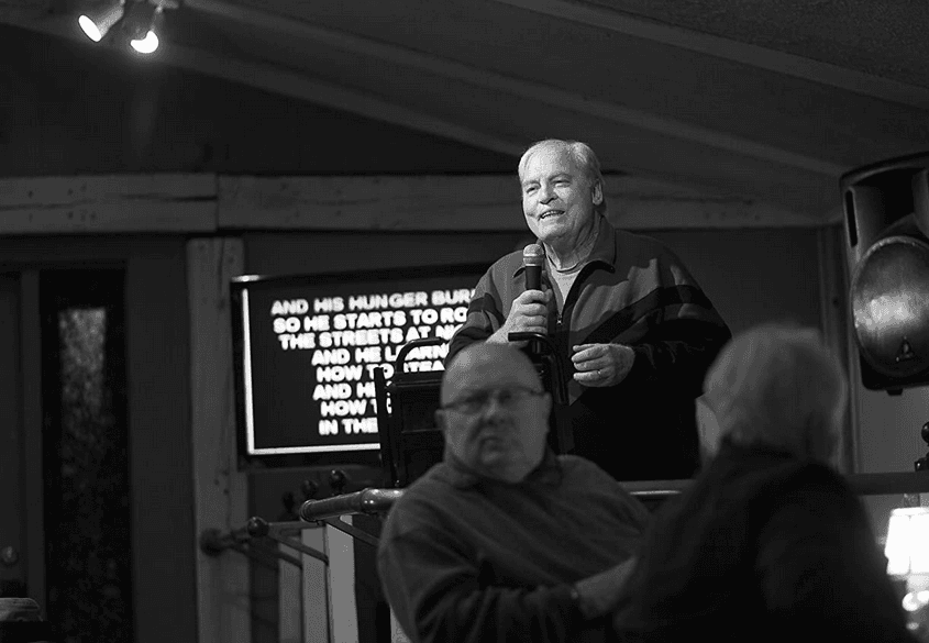Ed Pegram (Stacy Keach, standing) gives a warm welcome to Woody, in "Nebraska." (Paramount Vantage)