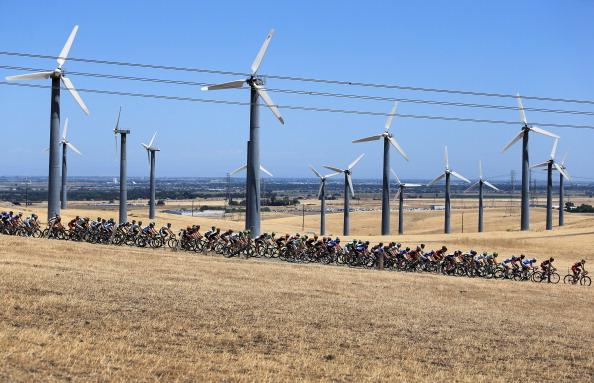 The peloton passes by windmills during Stage Seven of the 2013 Amgen Tour of California from Livermore to Mount Diablo in Alameda County, Calif. on May 18, 2013. (Doug Pensinger/Getty Images)