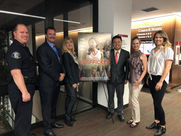 (L-R) City of Glendale Police Department Chief Carl Povilaitis; Burton Brink, Los Angeles County Sherriff Department Sergeant; Conroy Kanter, President of KK Ranch Productions, Inc.; President of Asian Industry B2B Marc Ang; Psychotherapist Deborah J. Vinall; Tracy Nielsen, Director of Care and Communications "I Am Treasure" in Glendale, Calif. on Sept. 28. (Annie Wang/The Epoch Times)