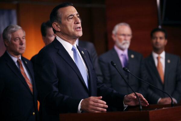 Rep. Darryll Issa (R-CA) is joined by more than a dozen Republican members of Congress as he speaks during a news conference about the Deferred Action for Childhood Arrivals (DACA) program at the U.S. Capitol, Nov. 9, 2017. (Chip Somodevilla/Getty Images)