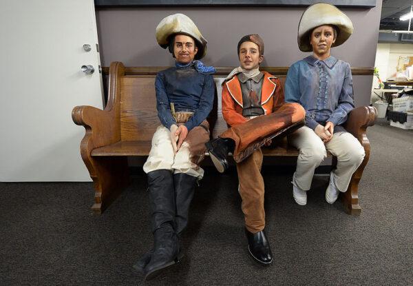 Models wait backstage before posing in the "living picture," Harold Lloyd “Safety First,” during the media night preview of the 81st annual festival The Pageant of the Masters at Laguna Beach, Calif., on June 3, 2013. (Joe Klamar/AFP via Getty Images)
