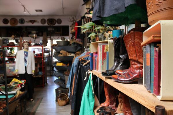 Items line the shelves inside MMD Antiques in Orange, Calif., on May 7, 2020. (Jamie Joseph/The Epoch Times)