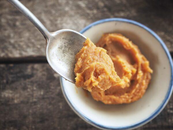 Salty, umami-rich miso paste, made from fermenting soybeans. (Successo Images/Shutterstock)