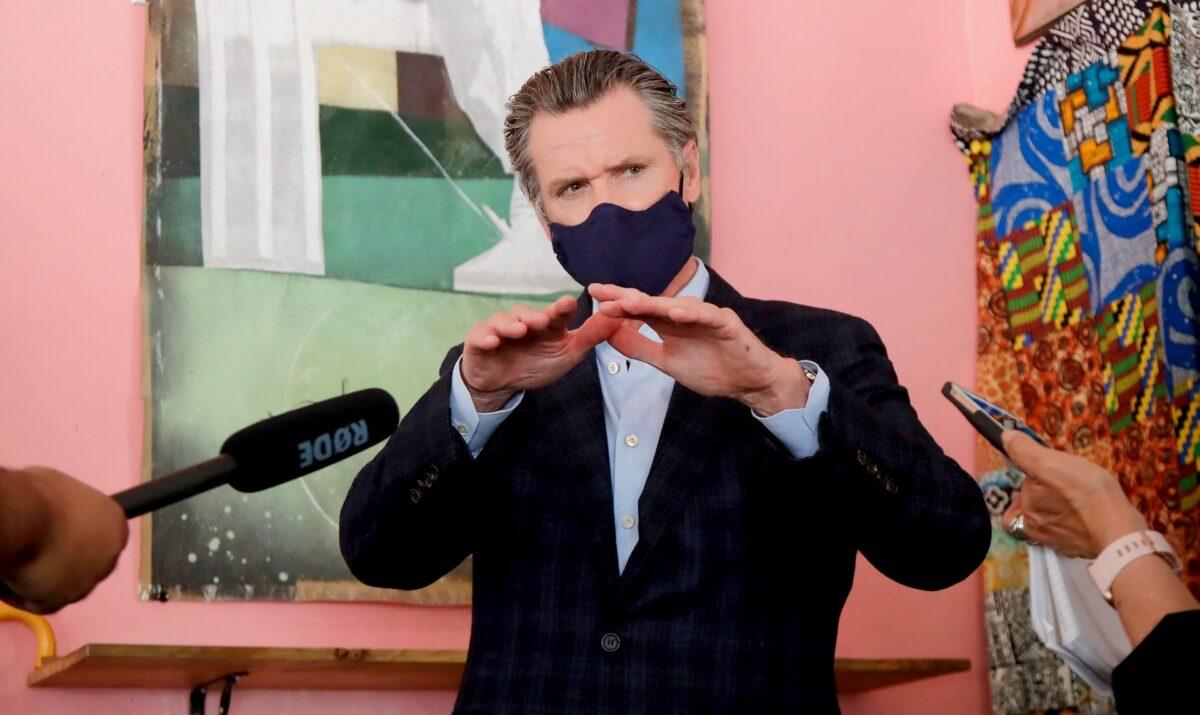 California Gov. Gavin Newsom talks about new policing and criminal justice reforms at Miss Ollie’s in Oakland, Calif., on June 9, 2020. (Courtesy of Associated Press Pool)